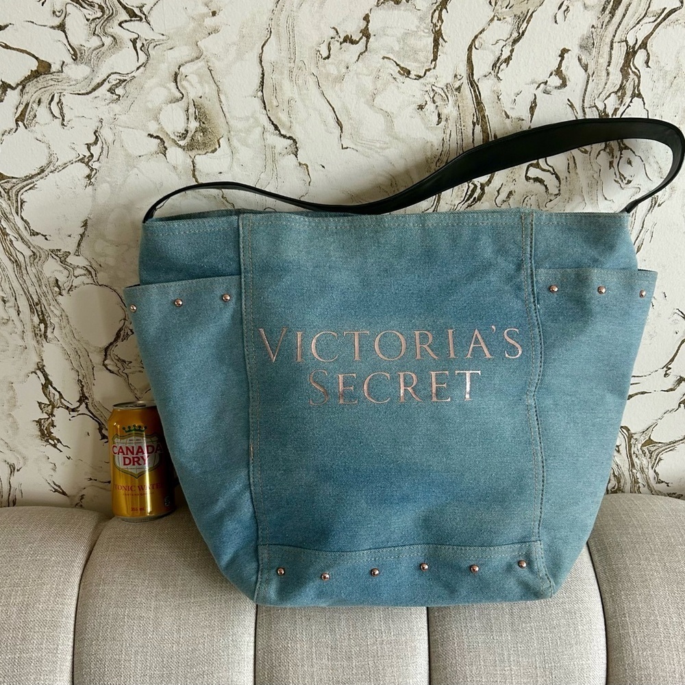 Victoria’s Secret Jean multi pocket tote bag. With rose gold colour metal studs